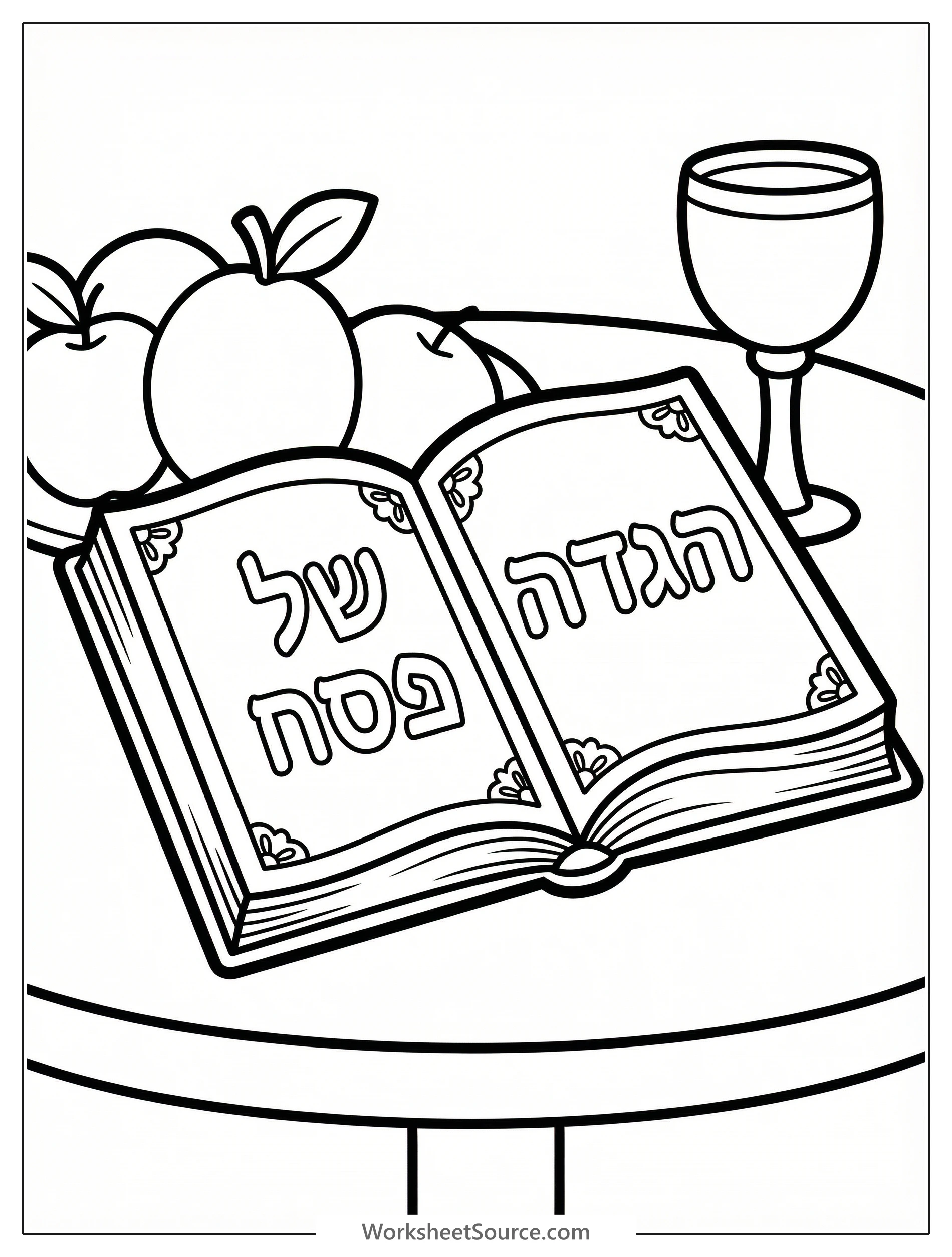 Decorated Haggadah book open on a table, displaying intricate Hebrew text and festive borders. Ready for coloring during Passover celebrations.